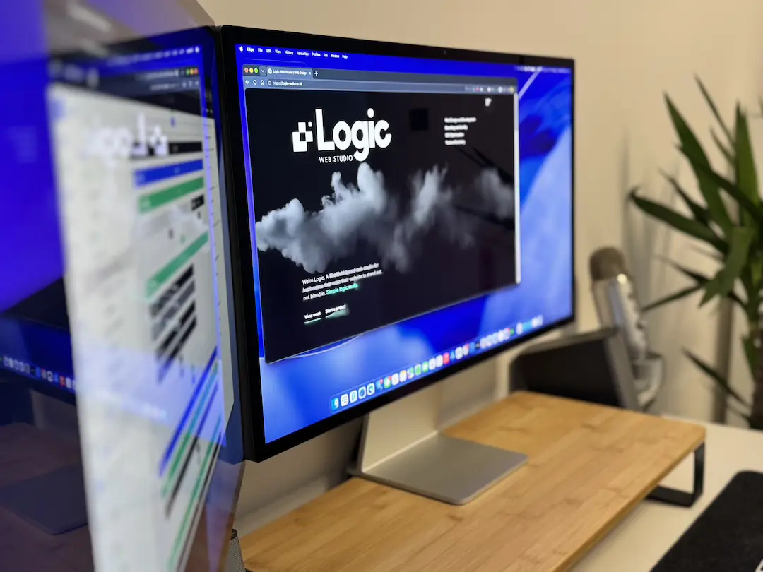 IMG_6499 copy Dual-monitor studio workspace displaying the Logic Web Studio website